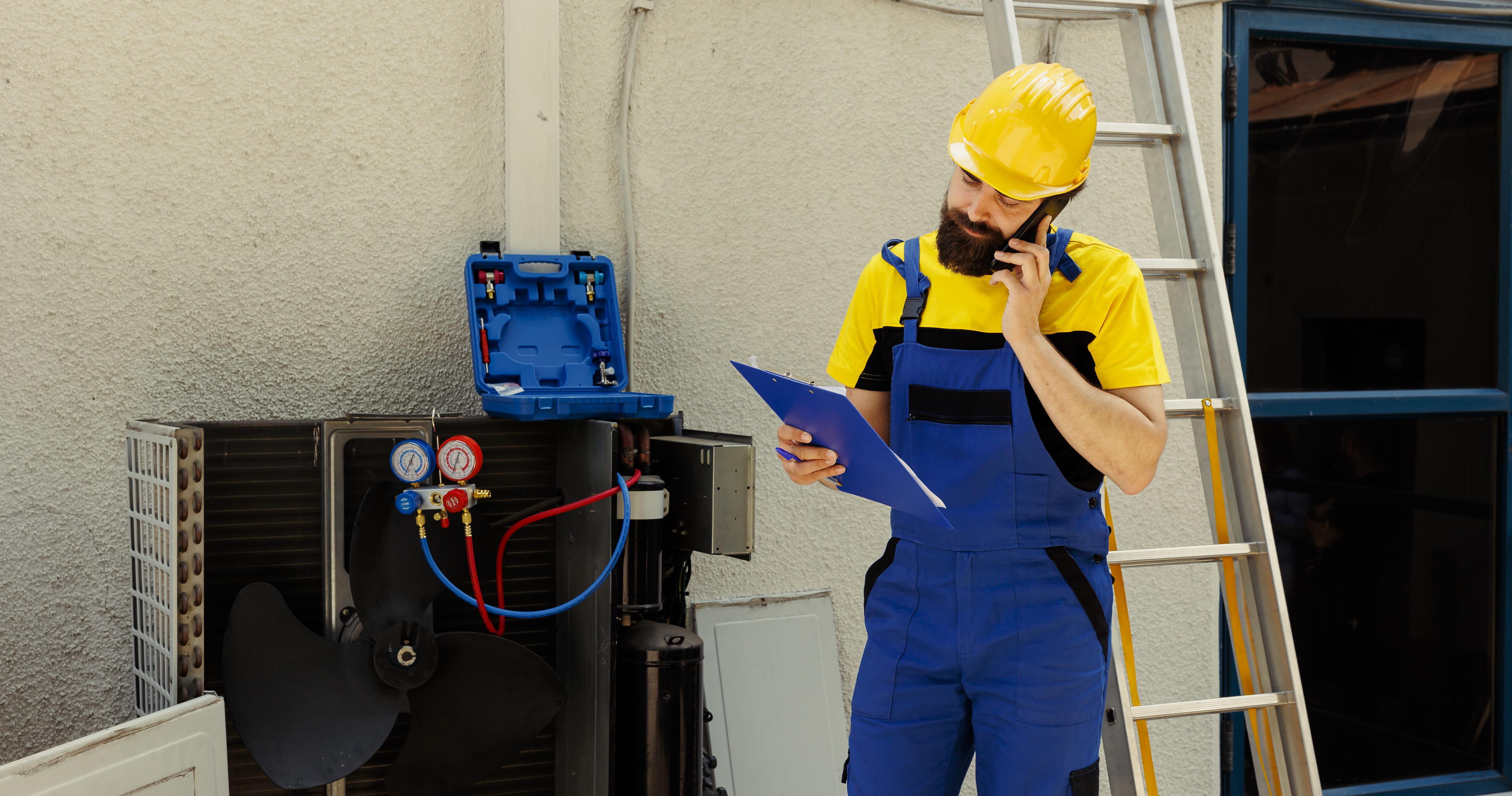 HVAC technician on service call